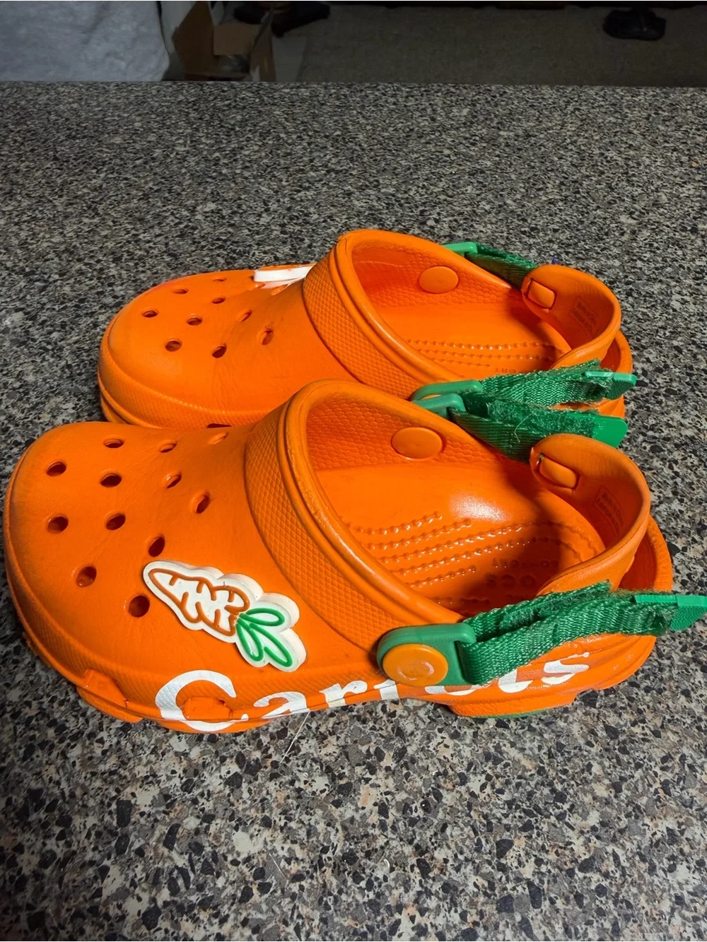 CROCS Kids Orange Clogs with Green Heel Strap